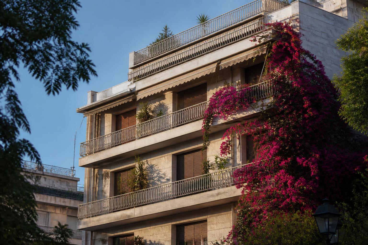 Classic Athenian apartment building in afternoon light